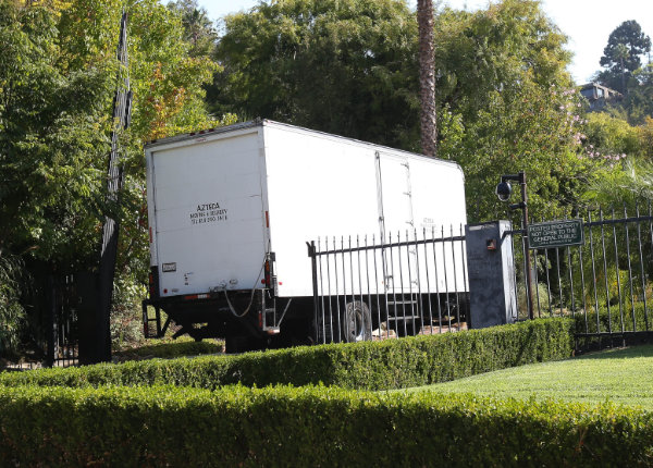 moving vans head to the pitt Jolie compound